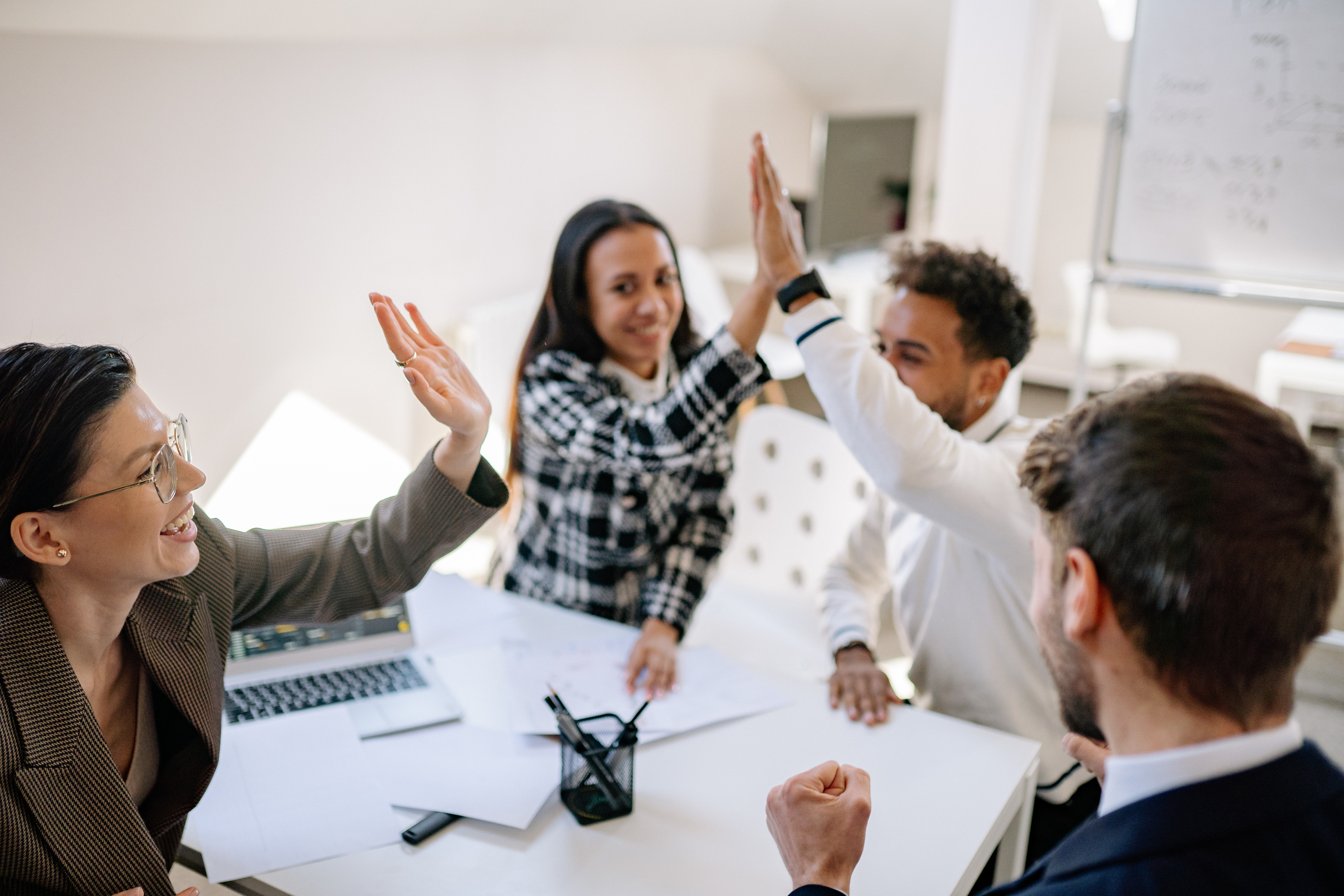 Happy Employees Doing High Five